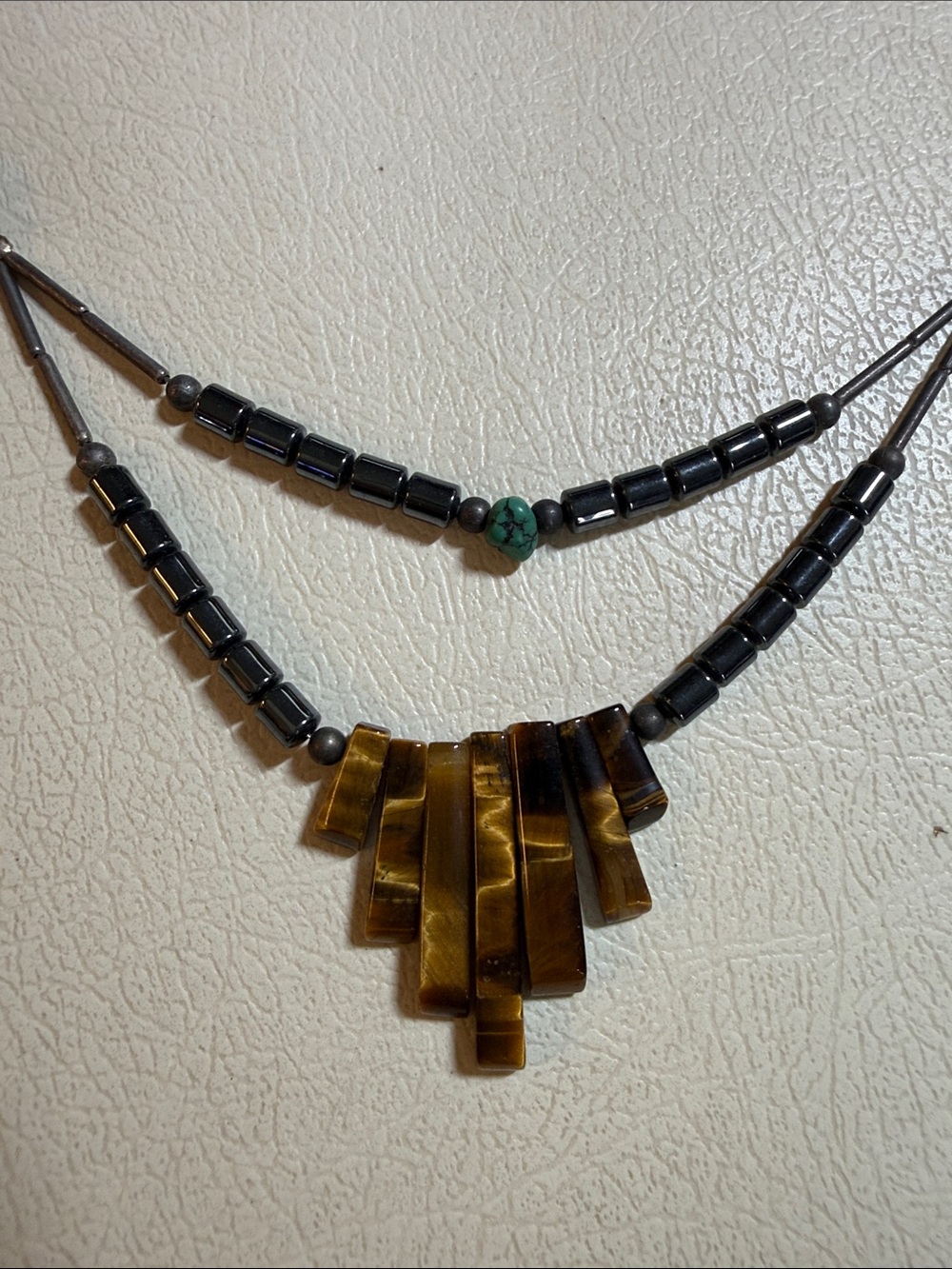 Hematite Bead Necklace with Brown Tortoiseshell Fan Pendant